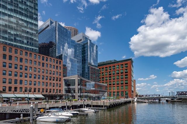 a view of a lake with a multi story building