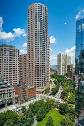 a view of a building with a yard
