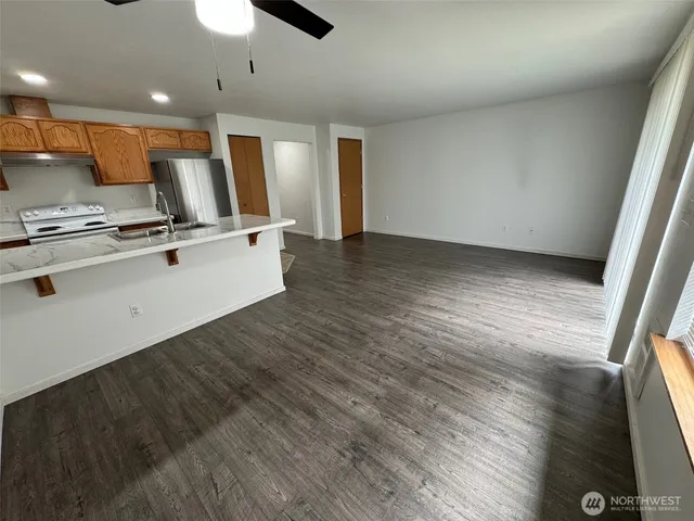 a view of kitchen with wooden floor