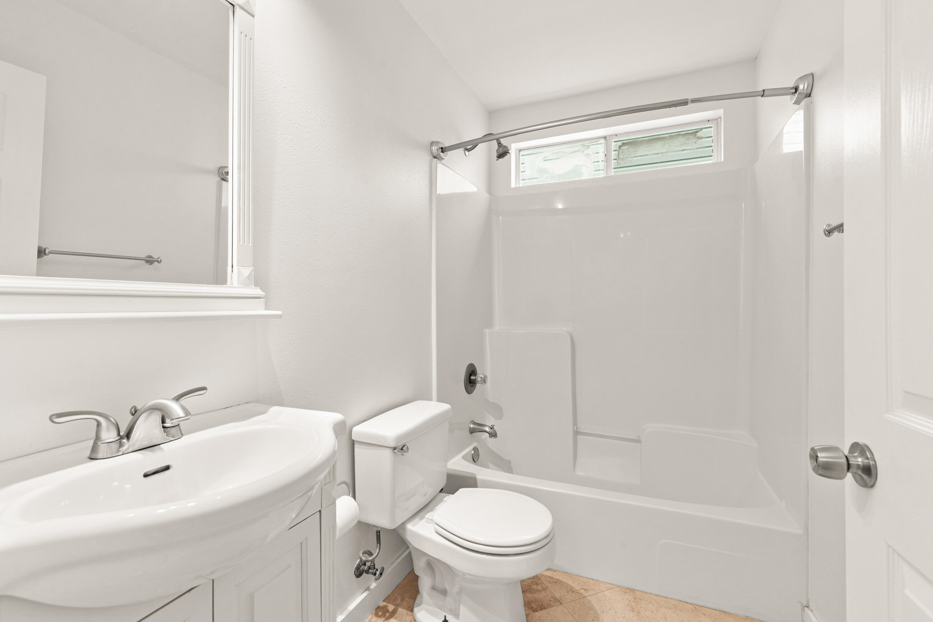 162 Vía Largo, Unit 22B Santa Rosa Beach, FL 32459 - Photo 15 of 26 a bathroom with a sink toilet and shower