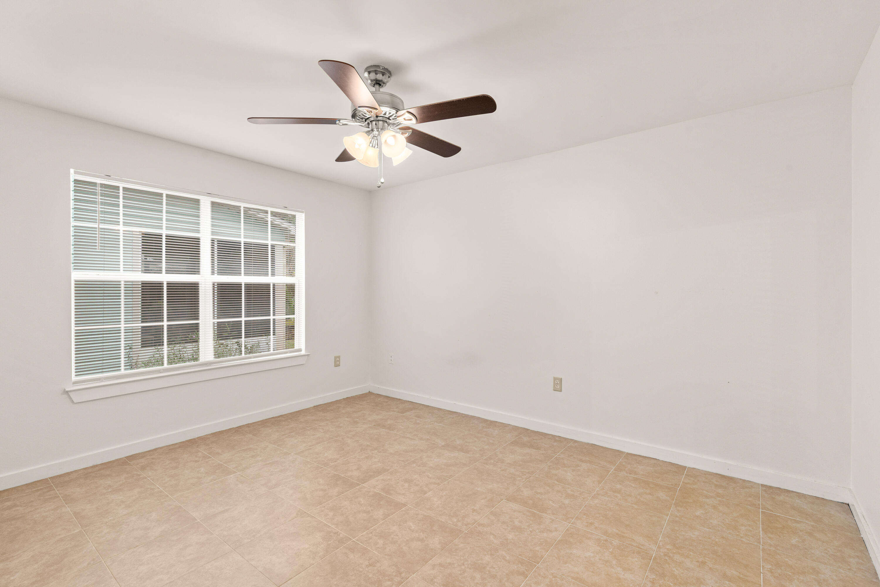 162 Vía Largo, Unit 22B Santa Rosa Beach, FL 32459 - Photo 17 of 26 an empty room with a window