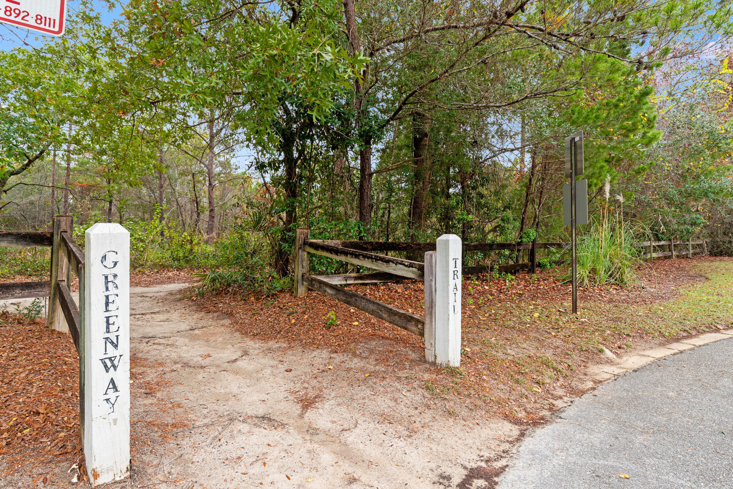 162 Vía Largo, Unit 22B Santa Rosa Beach, FL 32459 - Photo 24 of 26 a view of a backyard with large trees