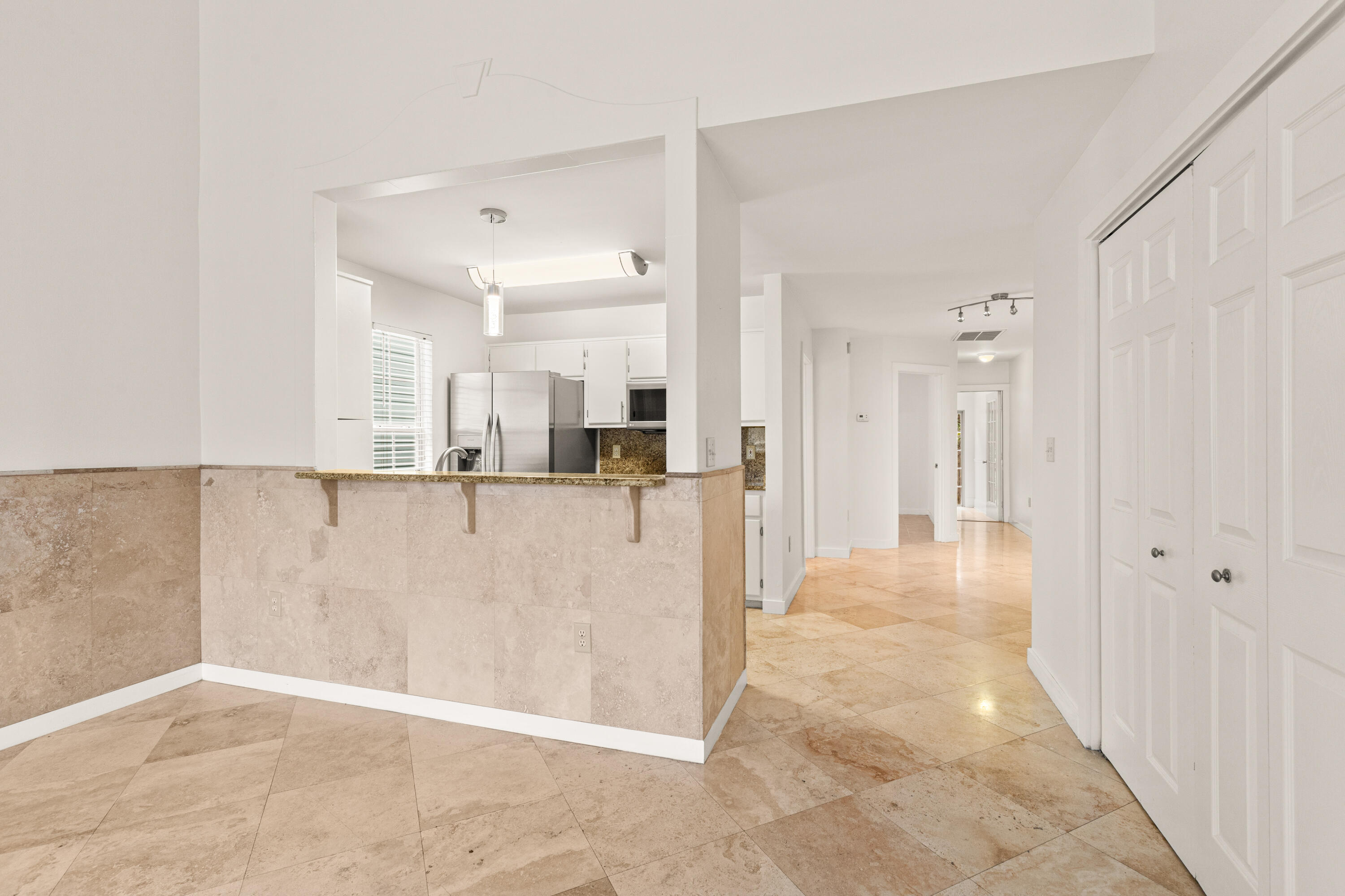 162 Vía Largo, Unit 22B Santa Rosa Beach, FL 32459 - Photo 10 of 26 a view of a bathroom with a tub shower door and a bathtub