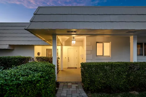 a front view of a house having yard