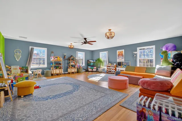 a outdoor living space with patio furniture and a fireplace