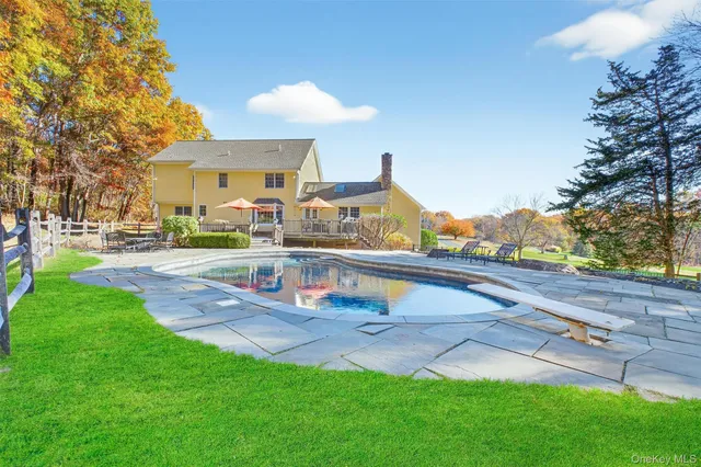 a view of a house with a swimming pool