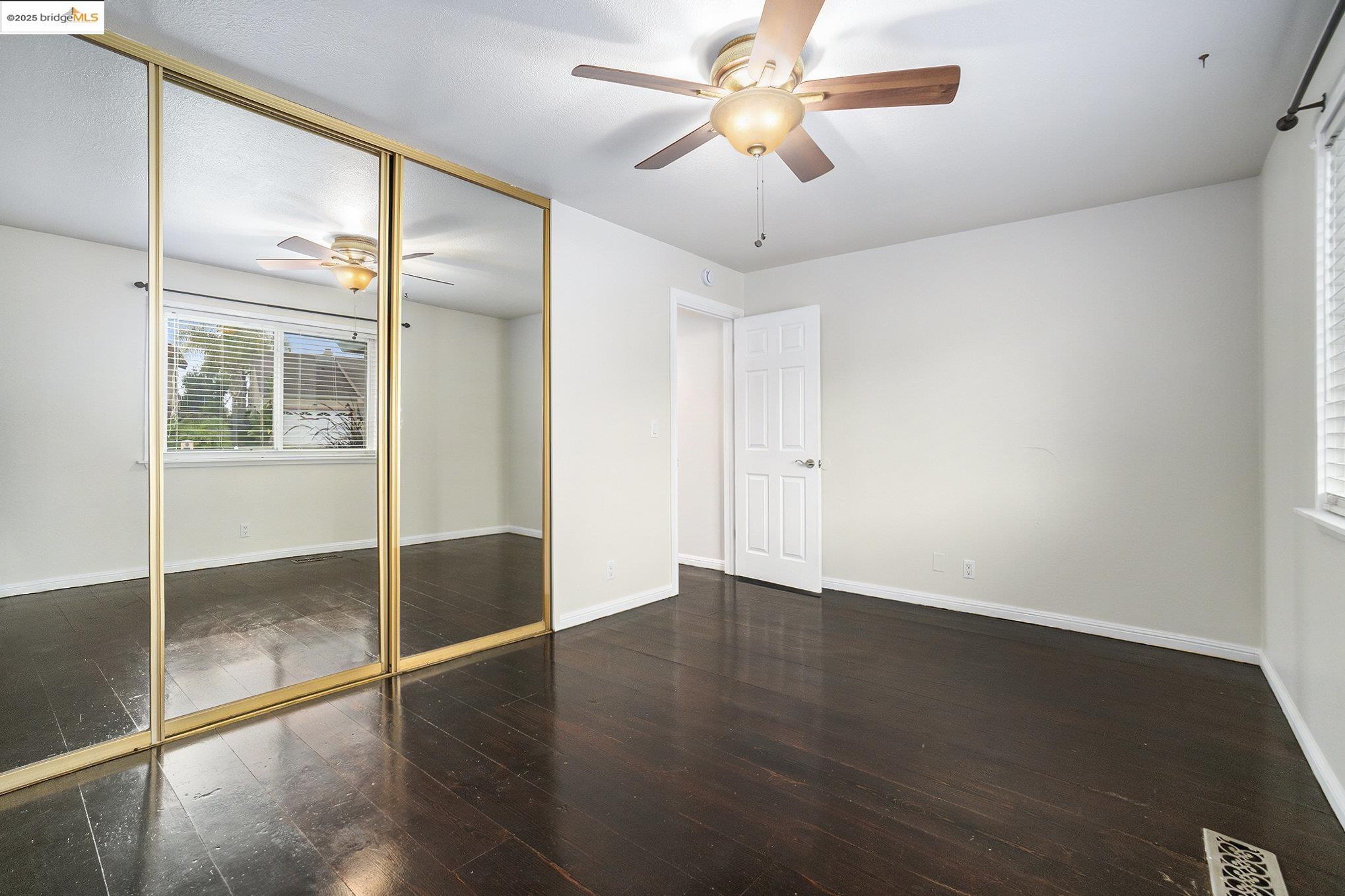 870 Willow Lake Road Discovery Bay, CA 94505 - Photo 22 of 39 a view of an empty room with a window