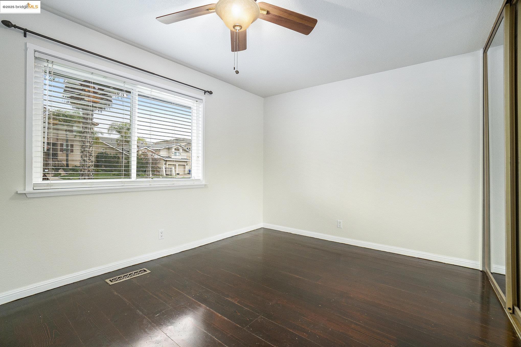 870 Willow Lake Road Discovery Bay, CA 94505 - Photo 23 of 39 an empty room with a window