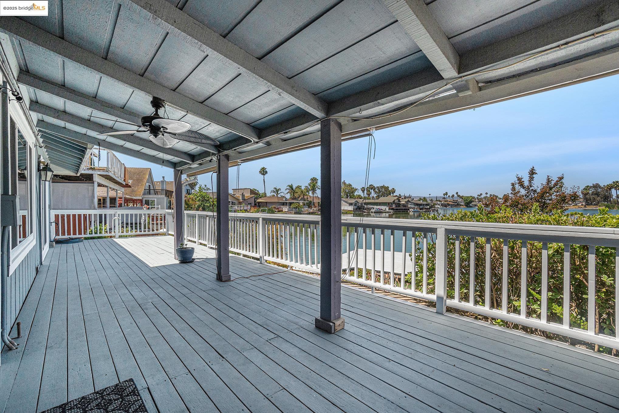 870 Willow Lake Road Discovery Bay, CA 94505 - Photo 26 of 39 a view of a balcony with wooden floor