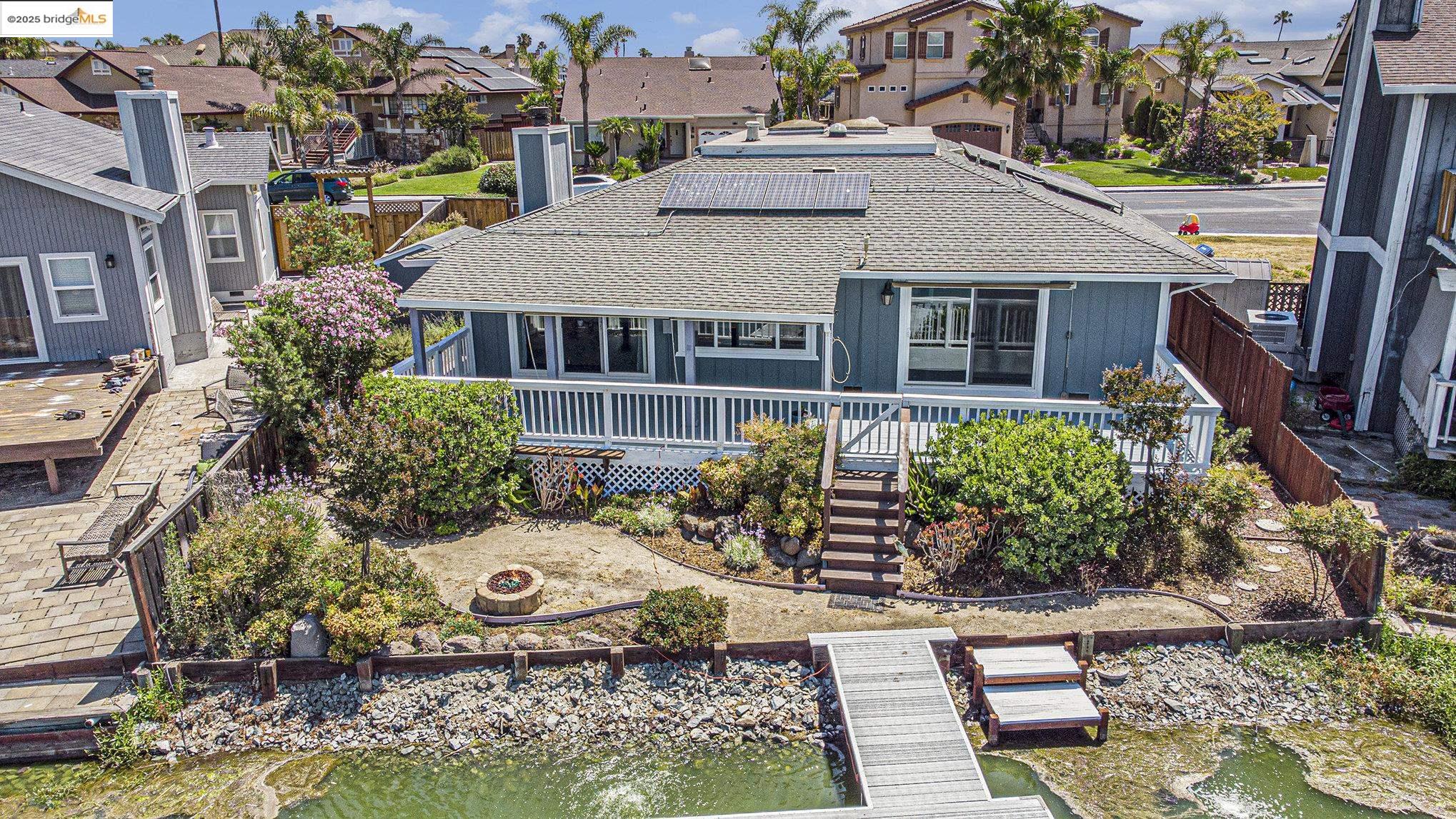 870 Willow Lake Road Discovery Bay, CA 94505 - Photo 34 of 39 front view of a house with a yard