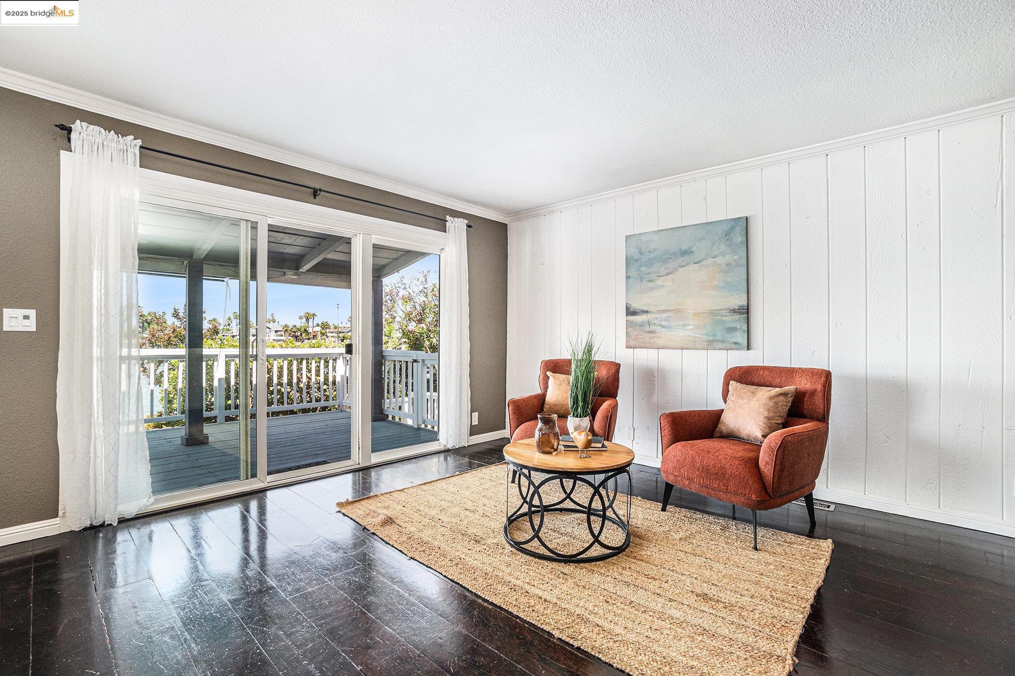870 Willow Lake Road Discovery Bay, CA 94505 - Photo 8 of 39 a living room with furniture and wooden floor