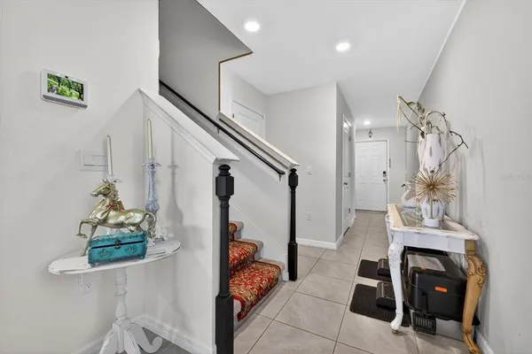 a view of entryway with stairs
