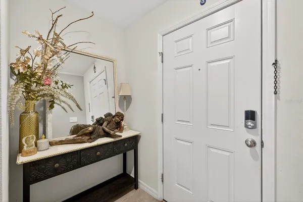 a bathroom with a sink a mirror and vanity