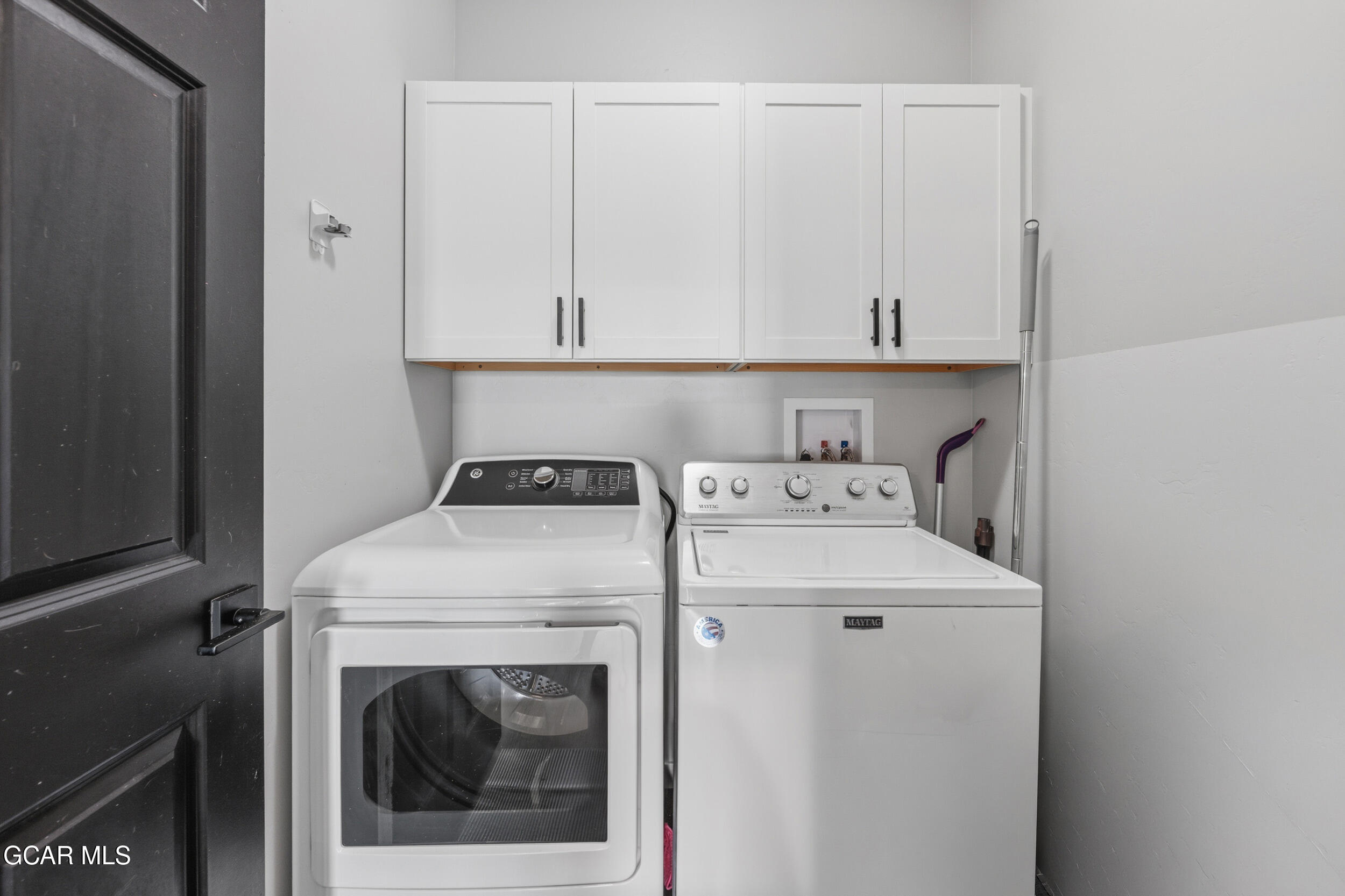 503 12th Street, Unit B Kremmling, CO 80459 - Photo 25 of 44 a utility room with dryer and washer