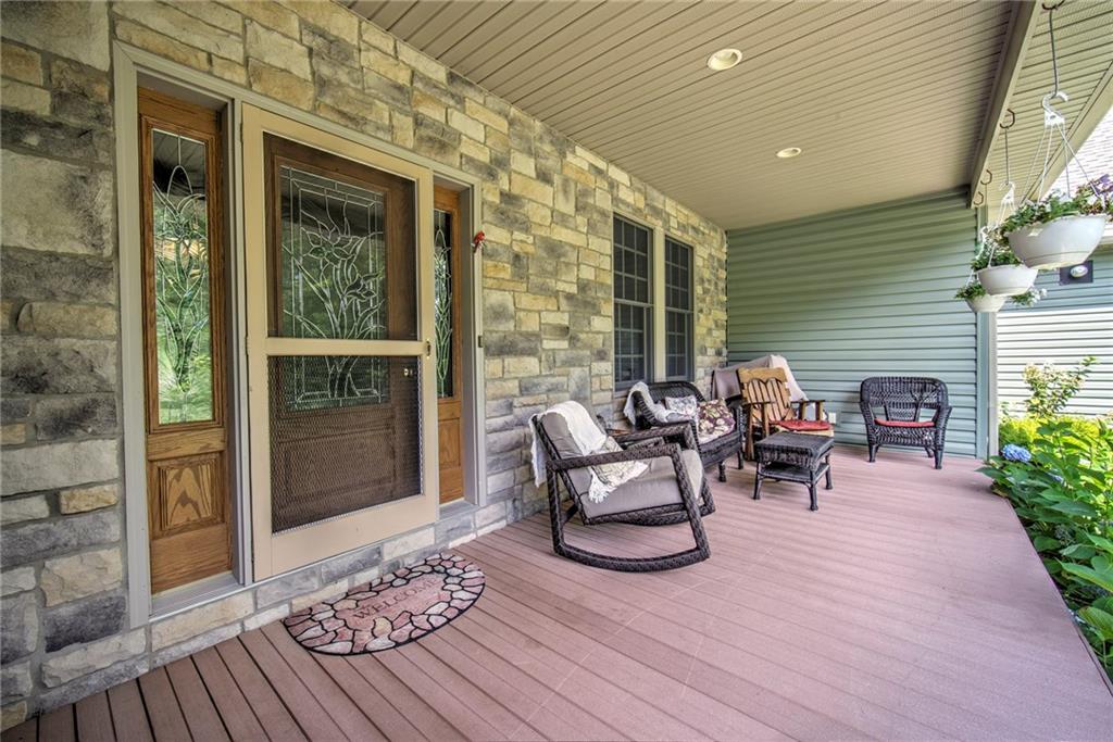 2857 Winner Road Clark, PA 16113 - Photo 2 of 25 Relax and enjoy the covered front porch looking out at the professionally landscaped yard!