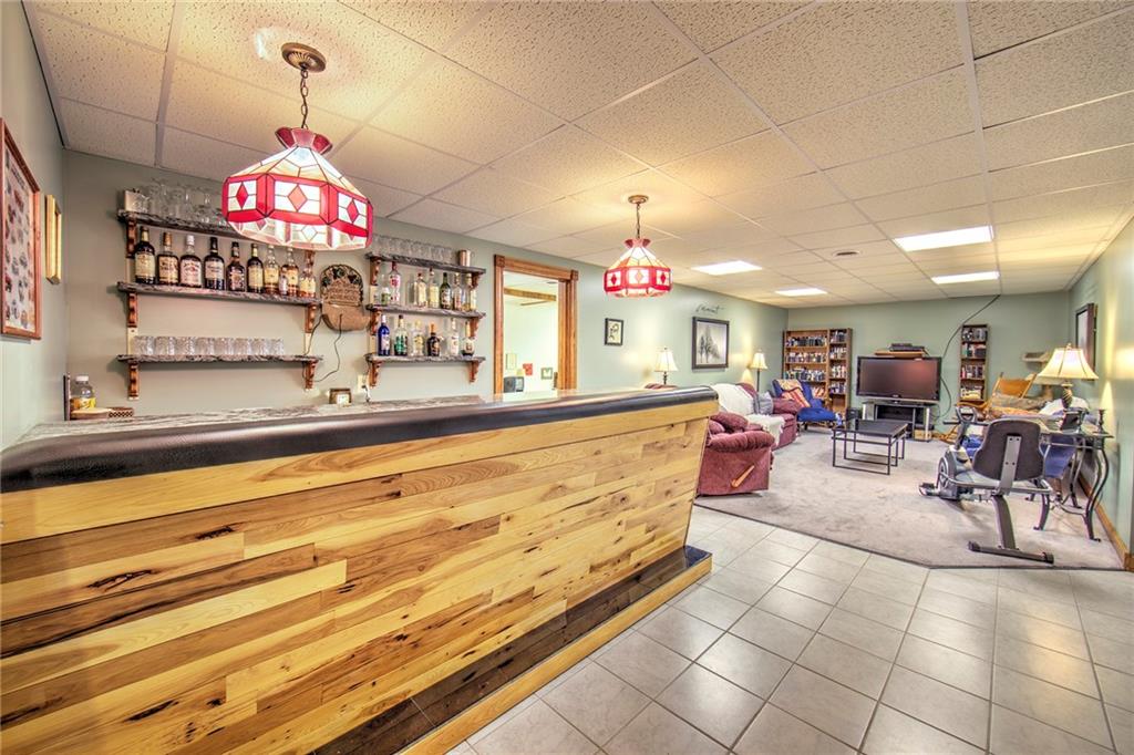 2857 Winner Road Clark, PA 16113 - Photo 20 of 25 Lower Level Family Room with built in bar.