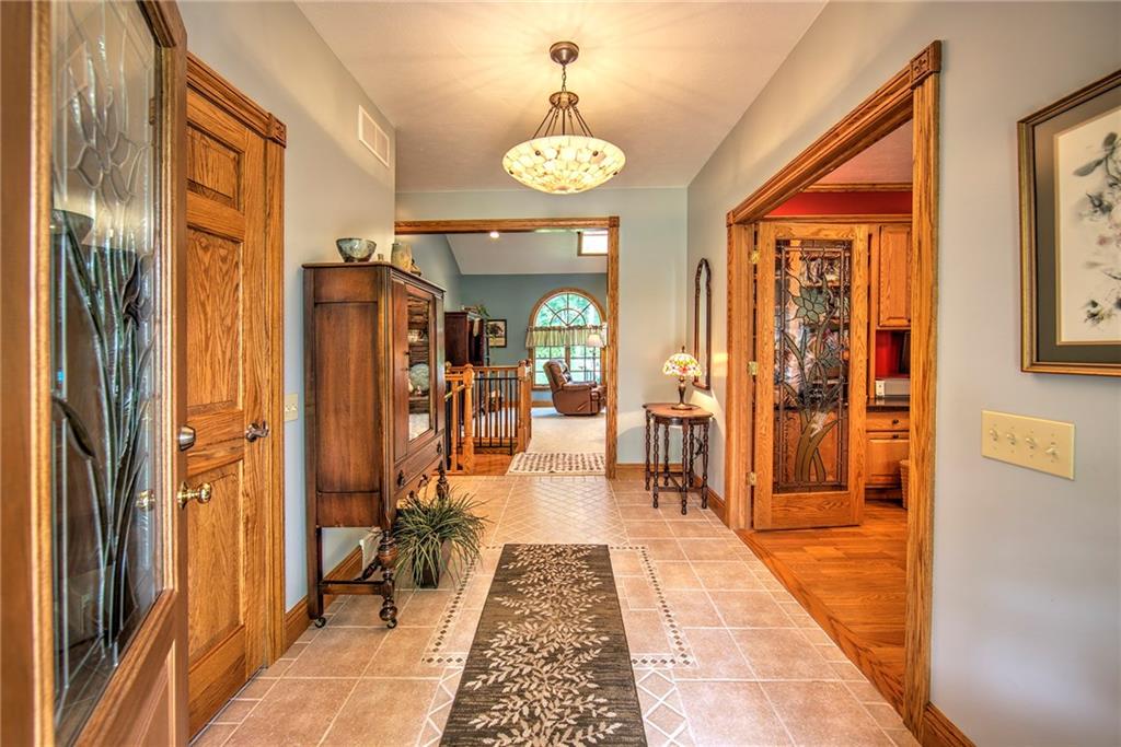 2857 Winner Road Clark, PA 16113 - Photo 3 of 25 13x7 level entry hall with access to the living room and den. Note leaded glass door inserts.