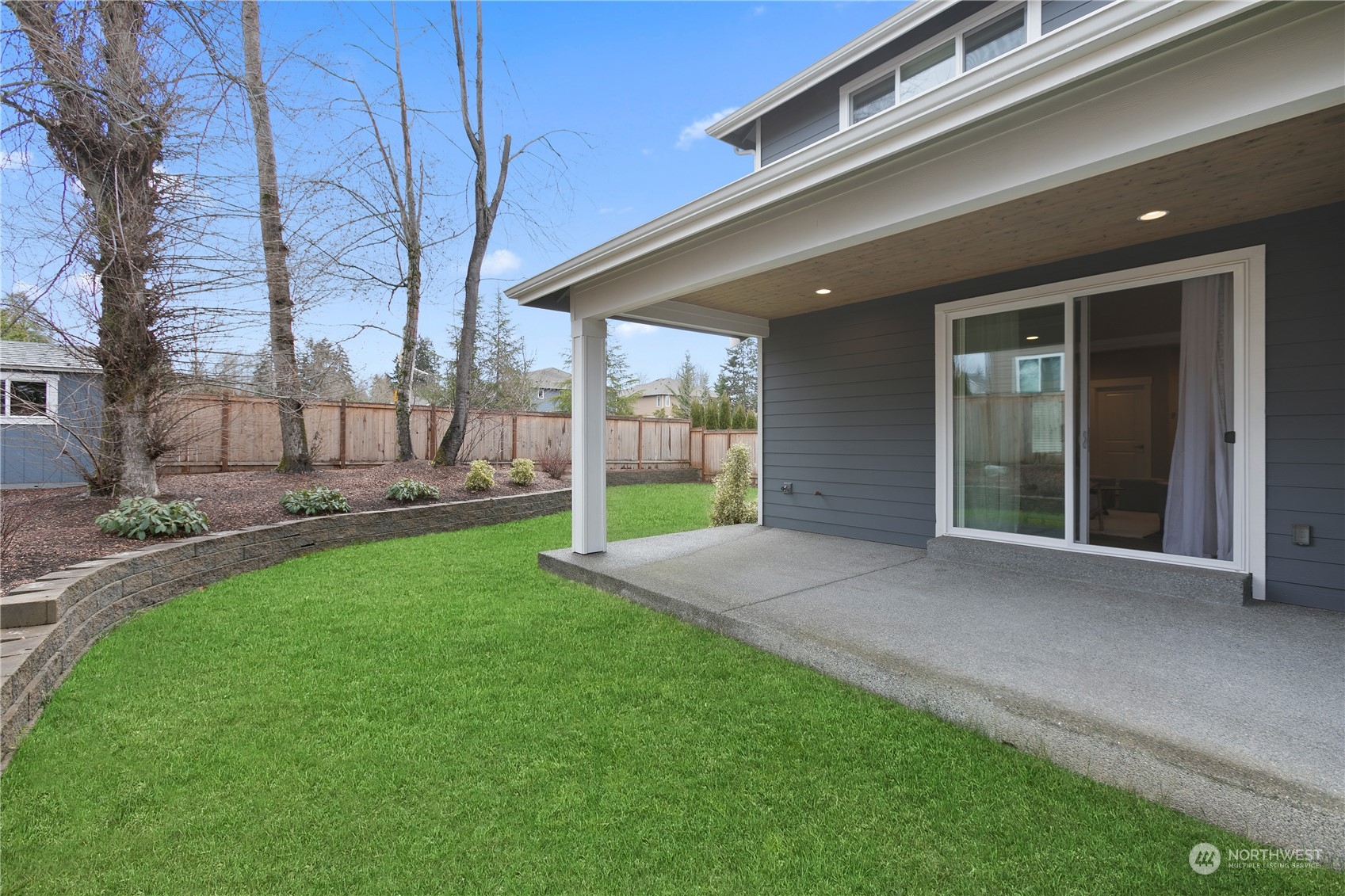 5626 Northeast 2nd Street Renton, WA 98059 - Photo 38 of 40 a view of a house with backyard and porch