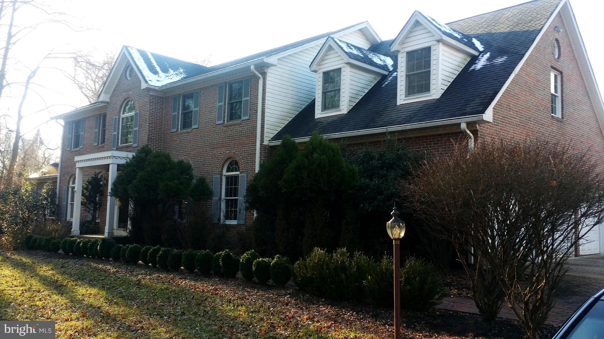 1310 Scotts Run Road McLean, VA 22102 - Photo 1 of 19 Classic brick front with covered portico