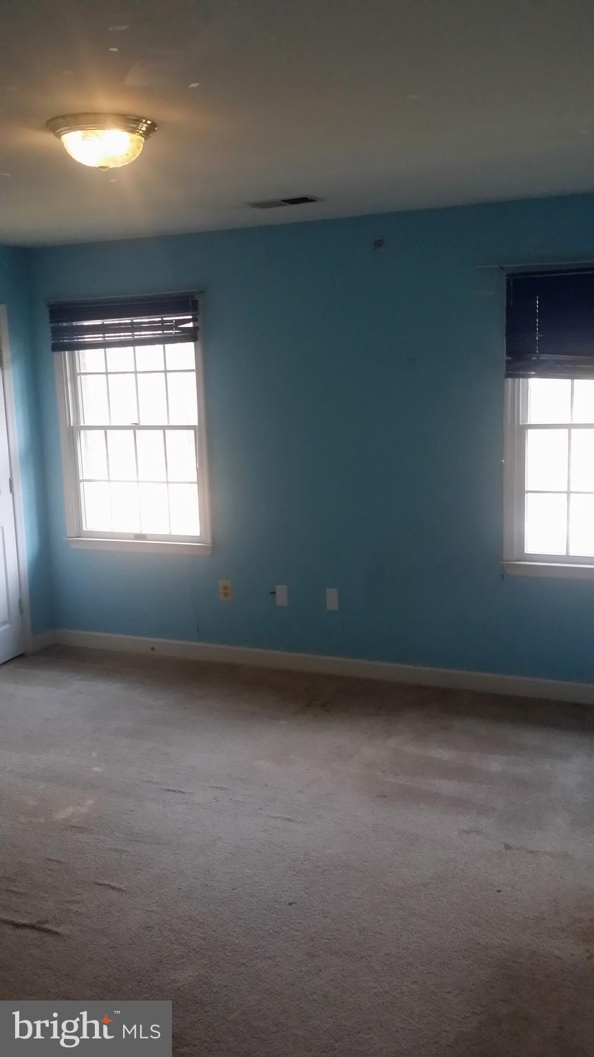 1310 Scotts Run Road McLean, VA 22102 - Photo 11 of 19 Light filled Bedroom with Andersen windows