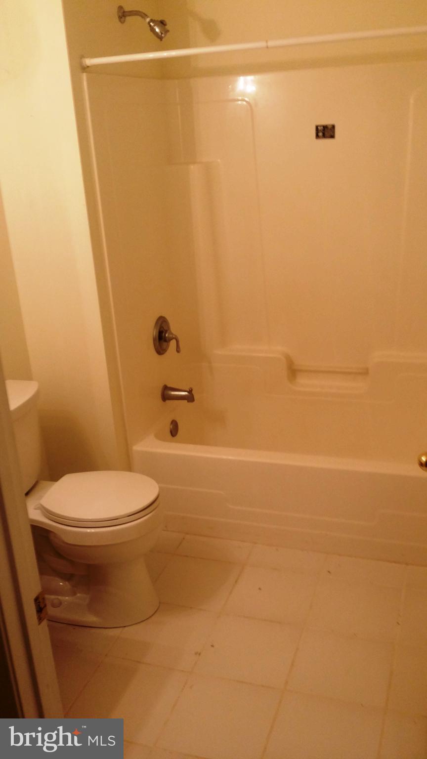 1310 Scotts Run Road McLean, VA 22102 - Photo 16 of 19 Full bath in lower level with 12 inch ceramic tile