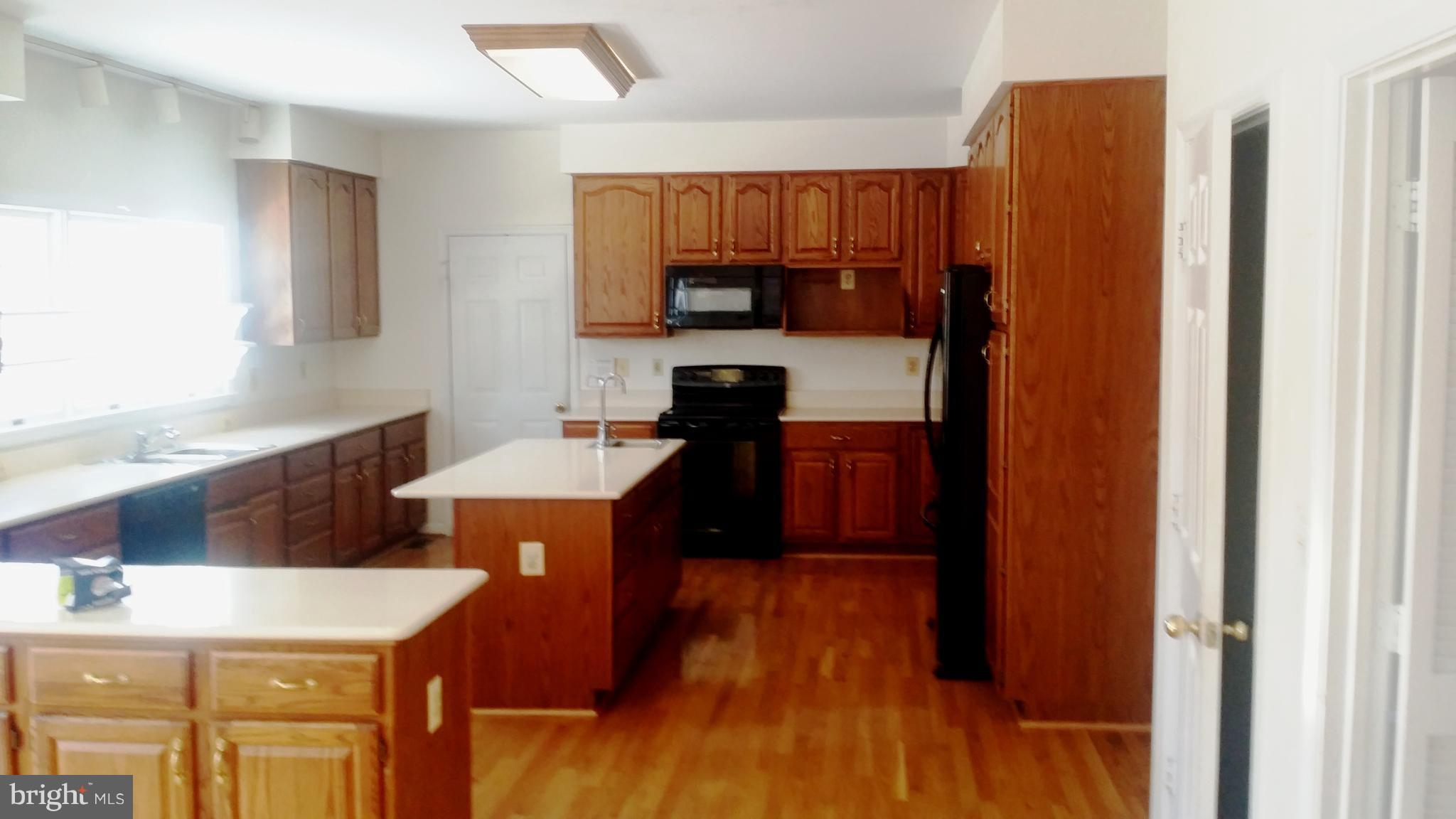 1310 Scotts Run Road McLean, VA 22102 - Photo 3 of 19 Kitchen with hardwood flooring
