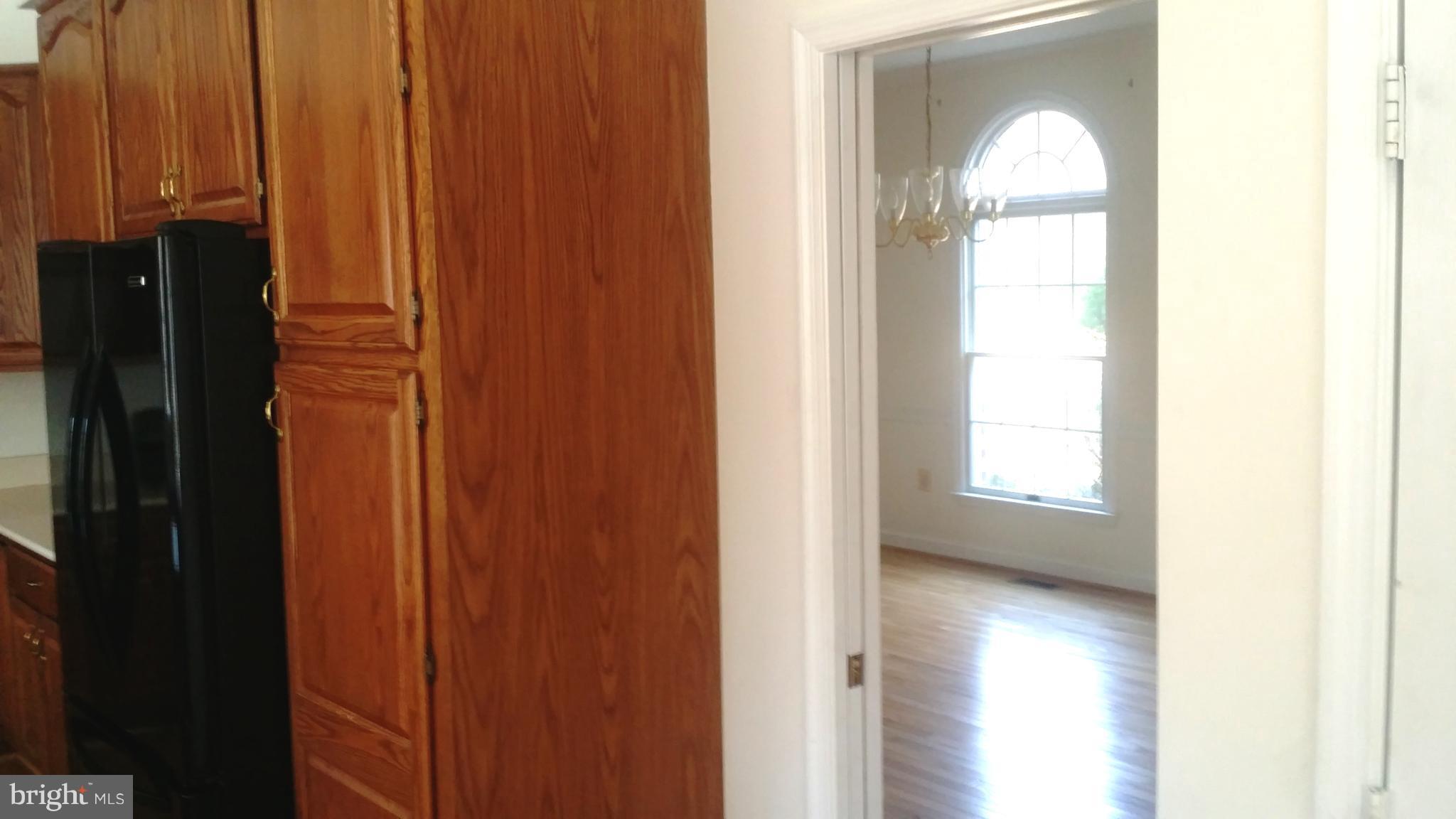 1310 Scotts Run Road McLean, VA 22102 - Photo 5 of 19 Good size Dining Room with hardwood flooring