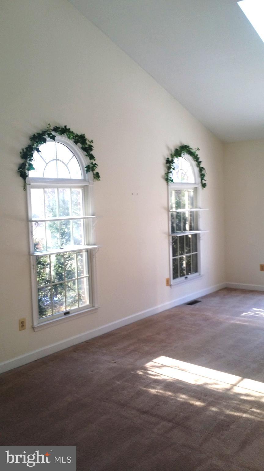 1310 Scotts Run Road McLean, VA 22102 - Photo 7 of 19 Separate Sunroom off of GR with palladian windows
