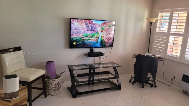 a workspace with furniture and window