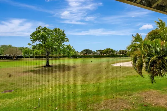 a view of a lake with a big yard
