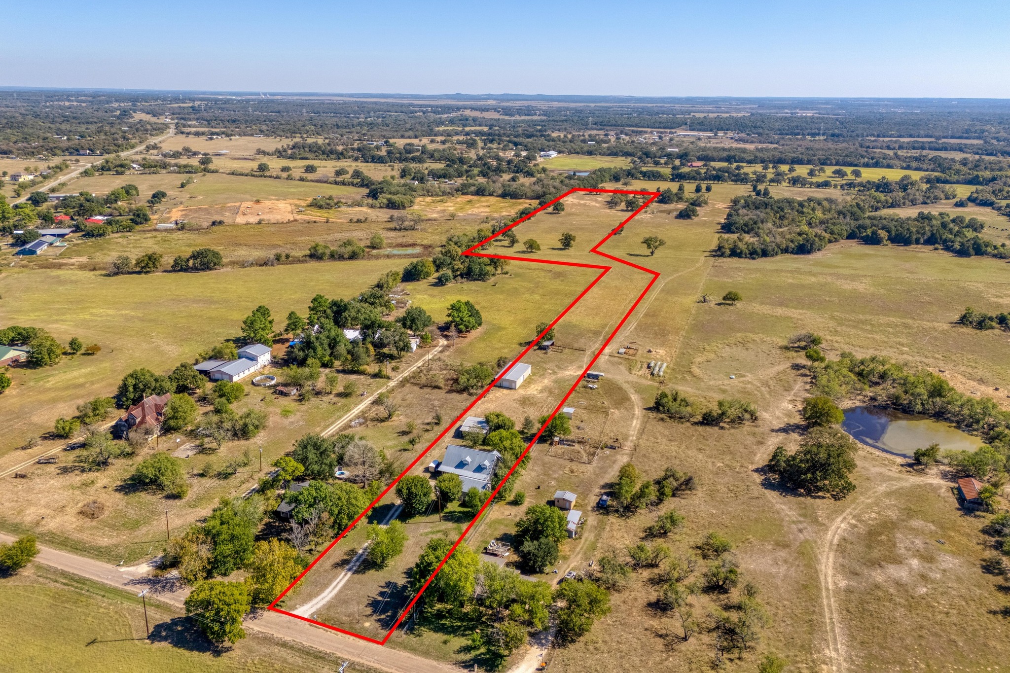 153 Pleasant Grove Road Elgin, TX 78621 - Photo 34 of 34 View of rural area featuring property parcel outlined