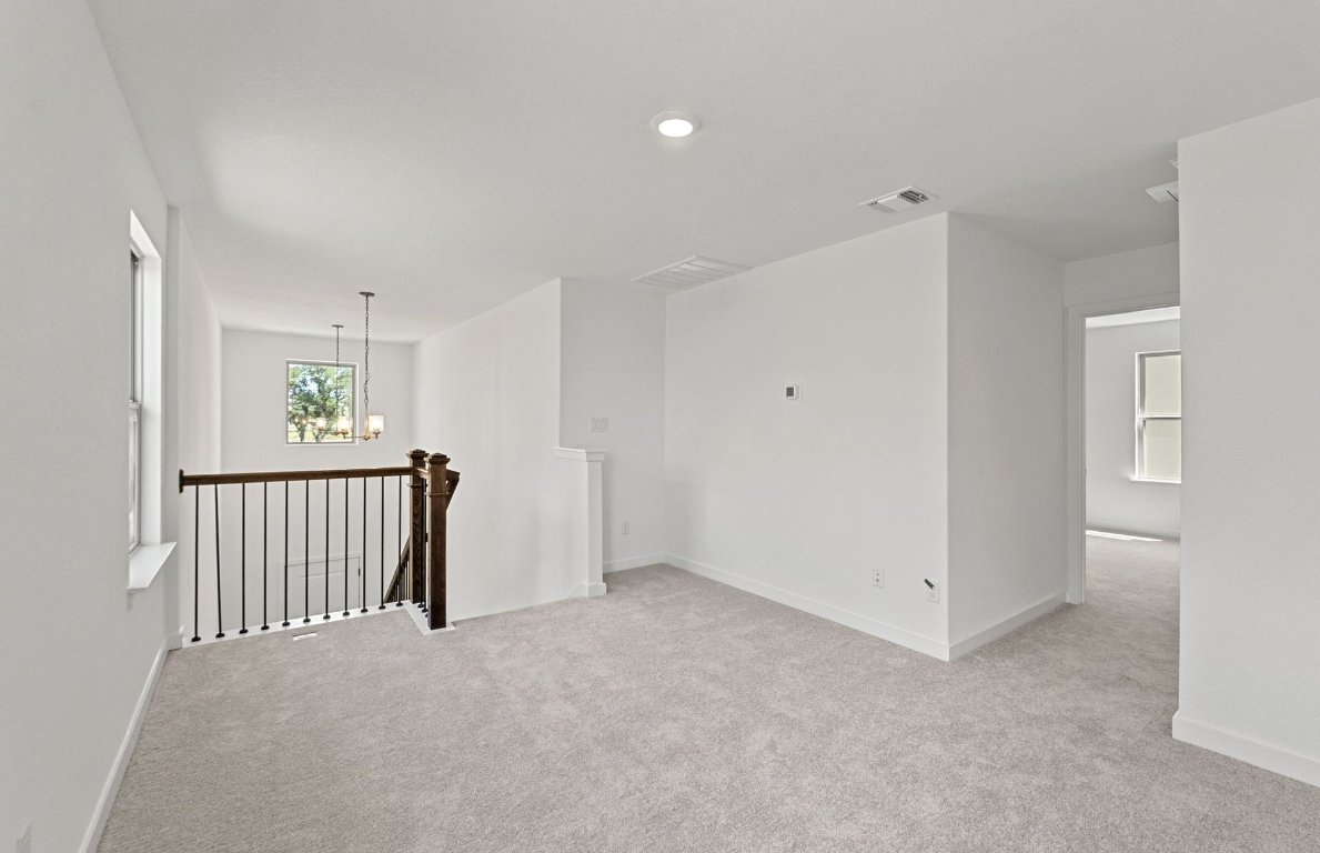 1817 Spg Mountain Cove Georgetown, TX 78628 - Photo 19 of 27 a view of an empty room with a window