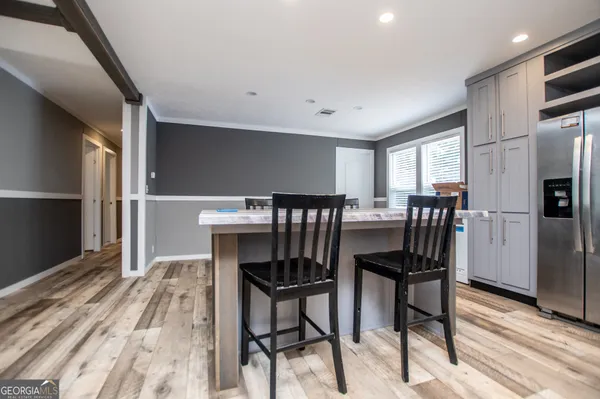 a view of a dining room with furniture