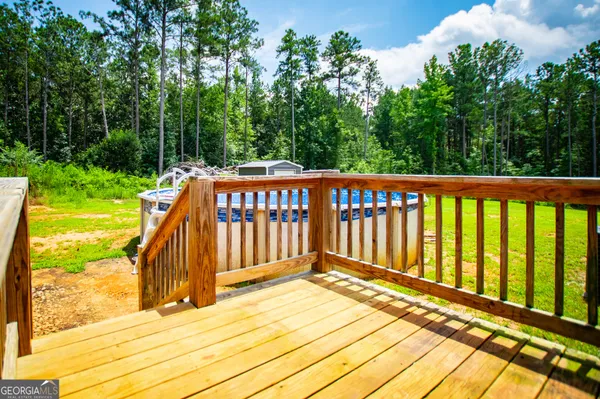 a view of a backyard with a patio