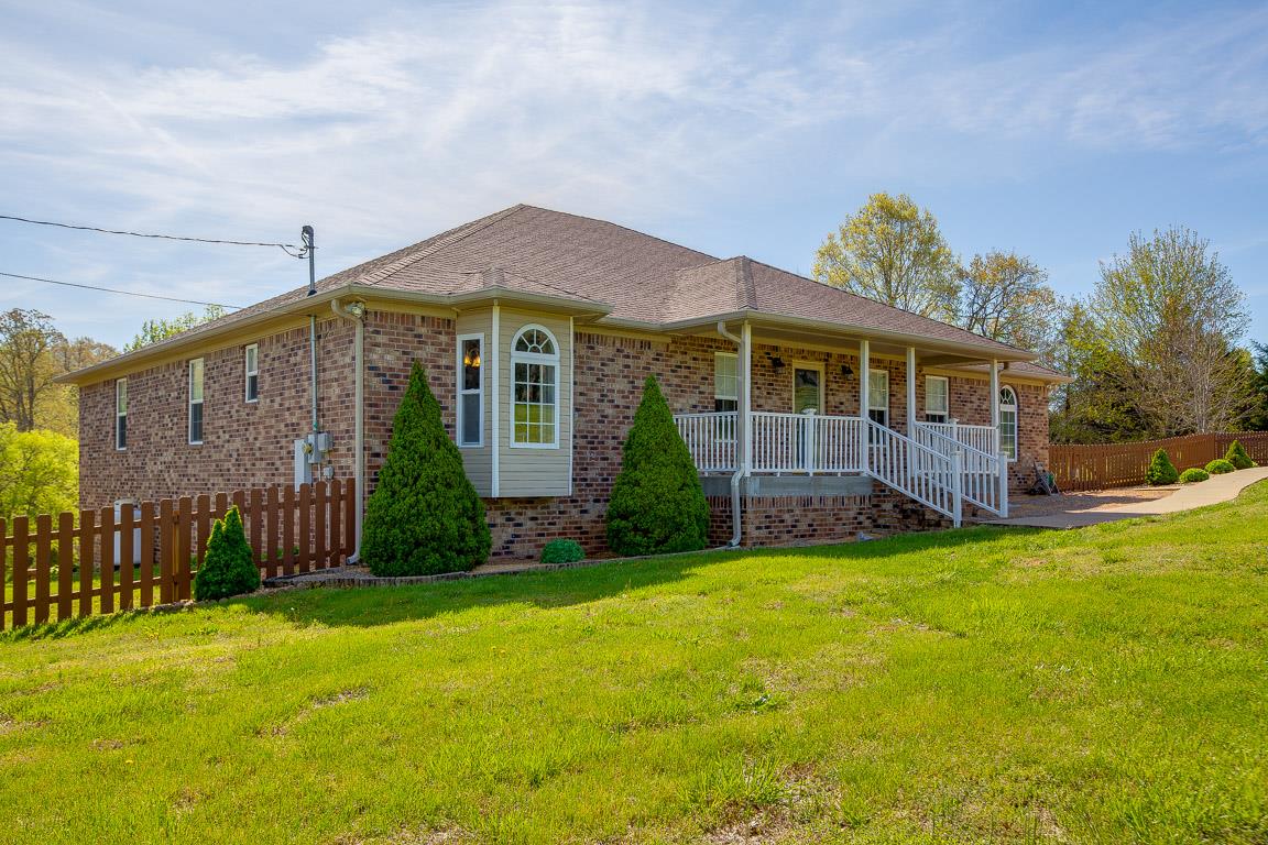 1712 New Vaughn Road Columbia, TN 38401 - Photo 2 of 23 4 bedrooms, 2 baths, outdoor living, unfinished walkout basement, 3 car garage, pool, outdoor building
