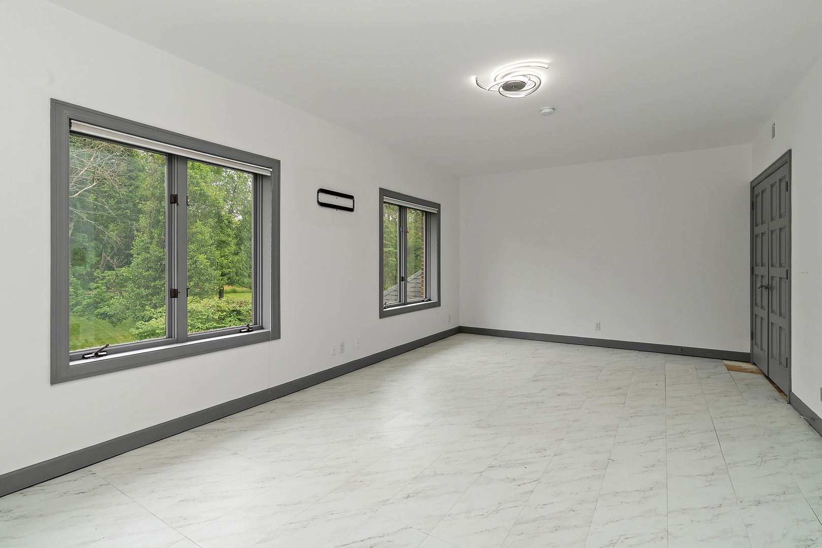 345 Bethany Road DeKalb, IL 60115 - Photo 31 of 71 a view of an empty room with a window
