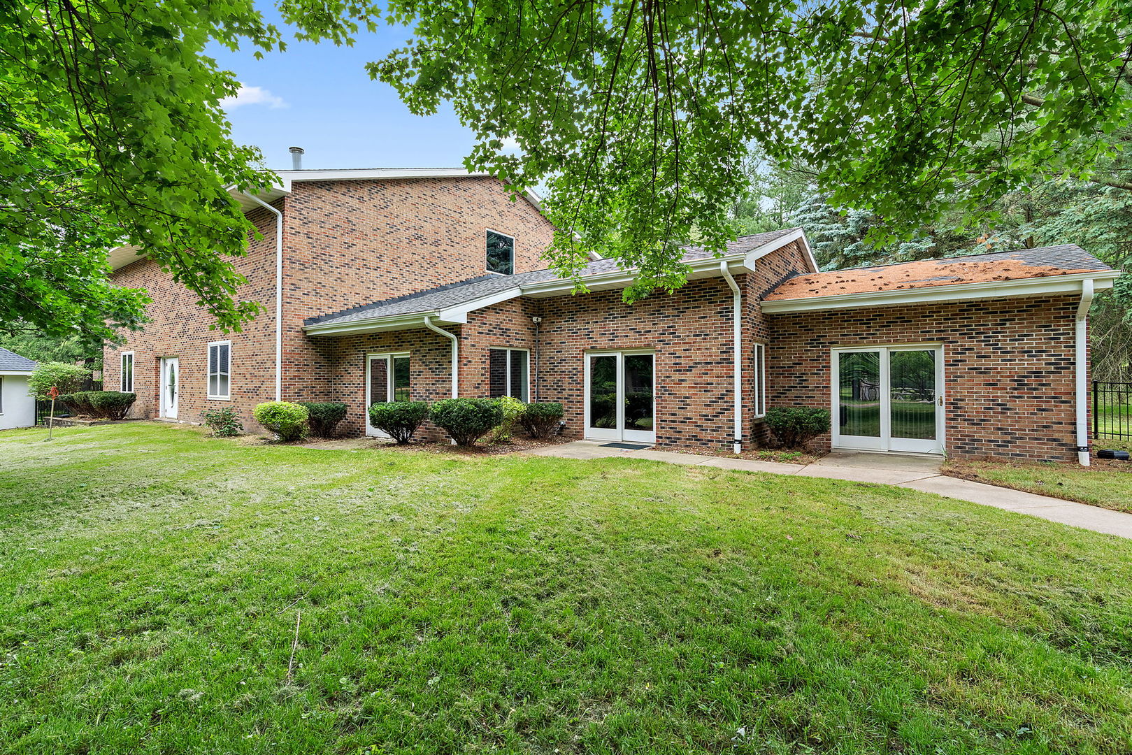 345 Bethany Road DeKalb, IL 60115 - Photo 40 of 71 a front view of a house with a garden