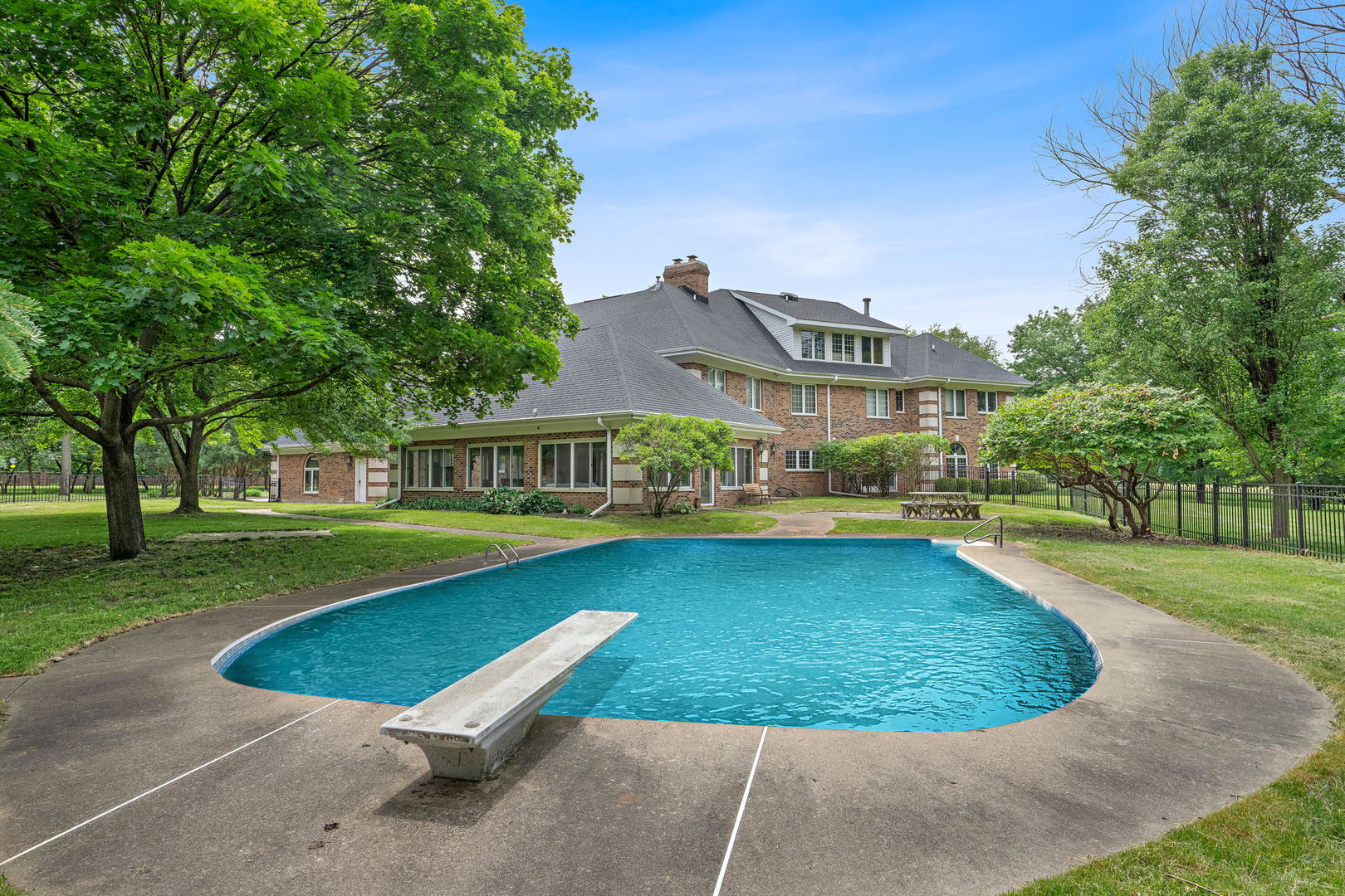 345 Bethany Road DeKalb, IL 60115 - Photo 52 of 71 a view of a house with a swimming pool