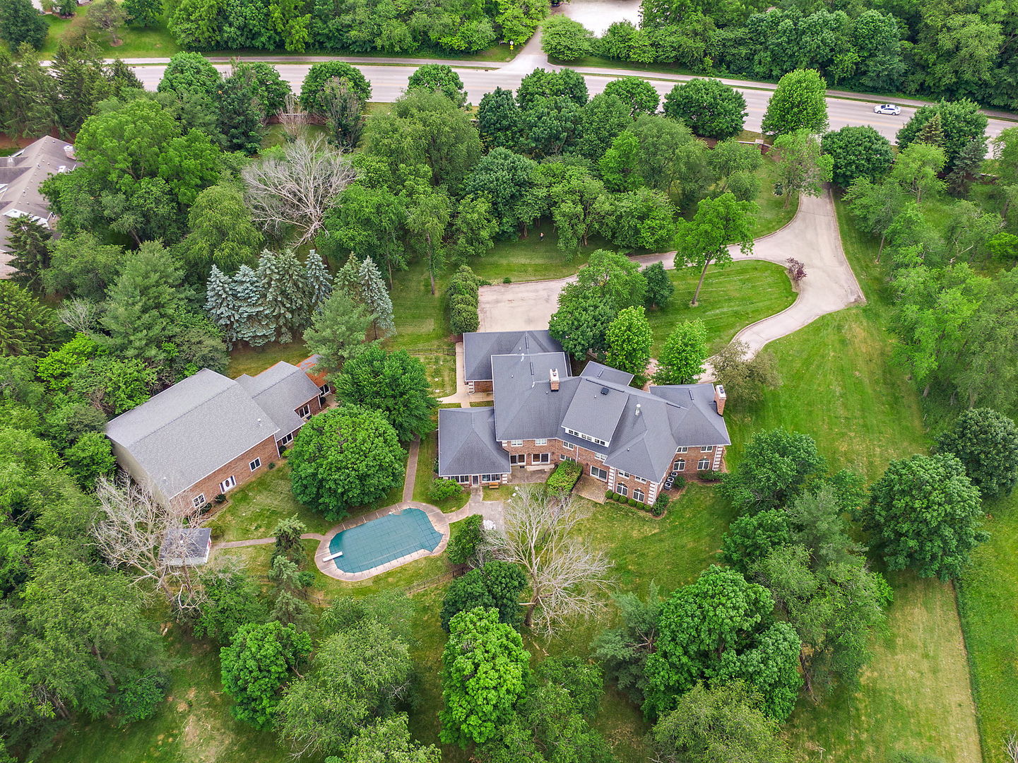 345 Bethany Road DeKalb, IL 60115 - Photo 60 of 71 an aerial view of a house with a yard
