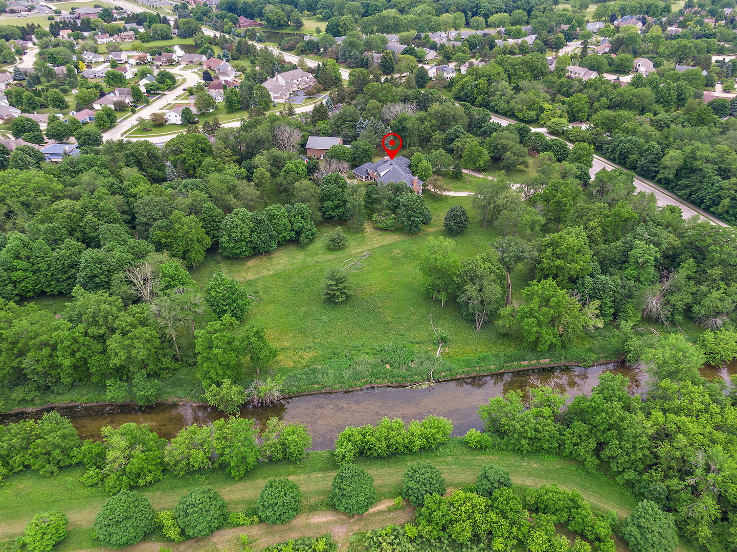 345 Bethany Road DeKalb, IL 60115 - Photo 63 of 71 an aerial view of residential houses with outdoor space and trees