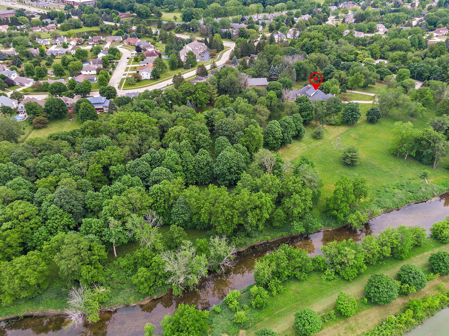 345 Bethany Road DeKalb, IL 60115 - Photo 64 of 71 an aerial view of residential houses with outdoor and green space