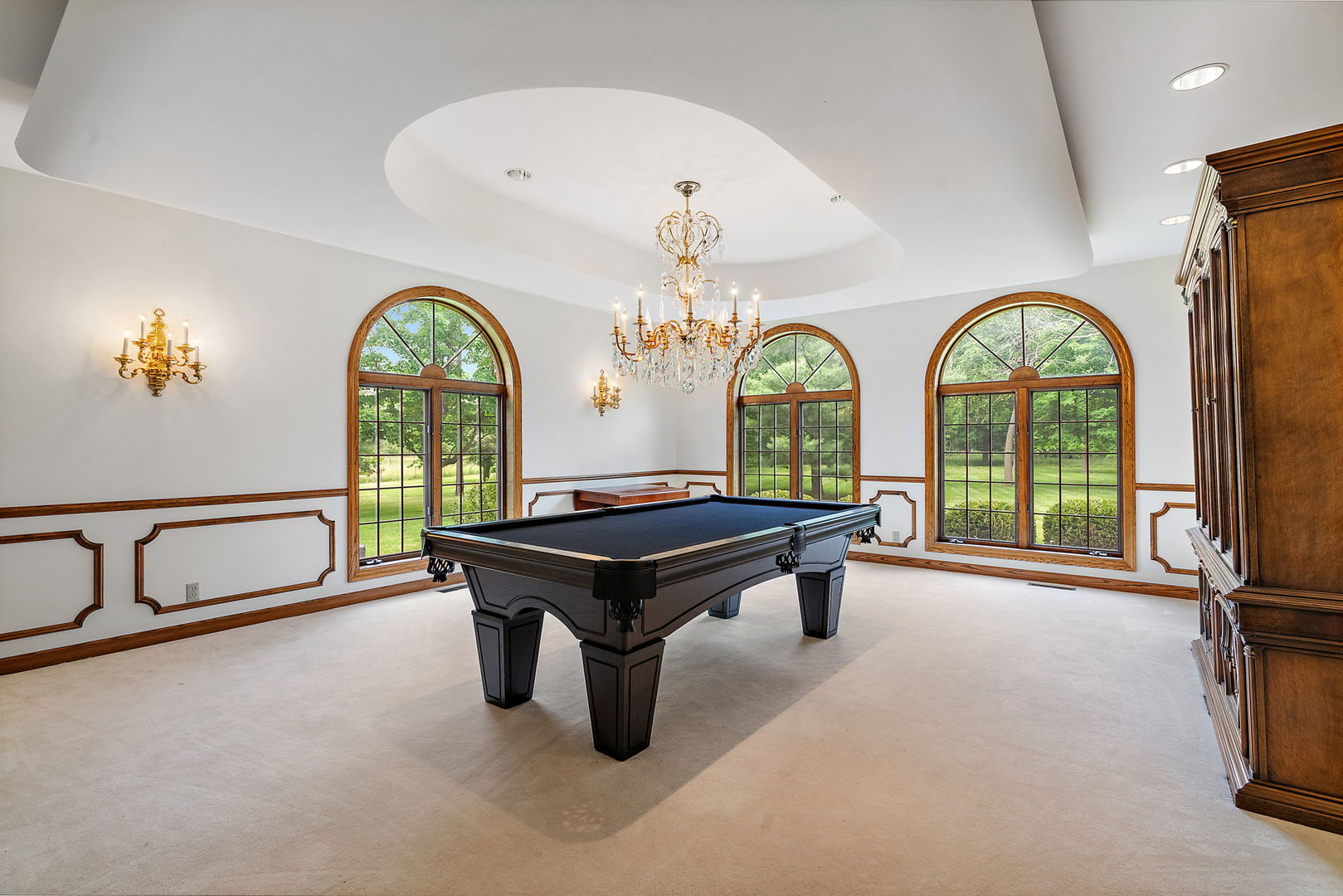 345 Bethany Road DeKalb, IL 60115 - Photo 9 of 71 a living room with furniture a pool table and a large window