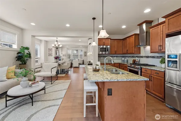 a large kitchen with lots of counter space and a sink