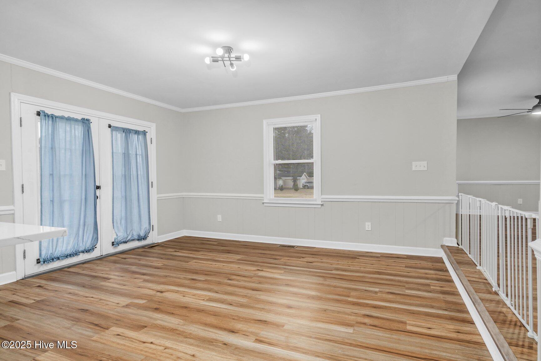 1800 Springfield Road Rocky Mount, NC 27801 - Photo 15 of 26 Eat-In Dining Nook features French doors to rear deck.