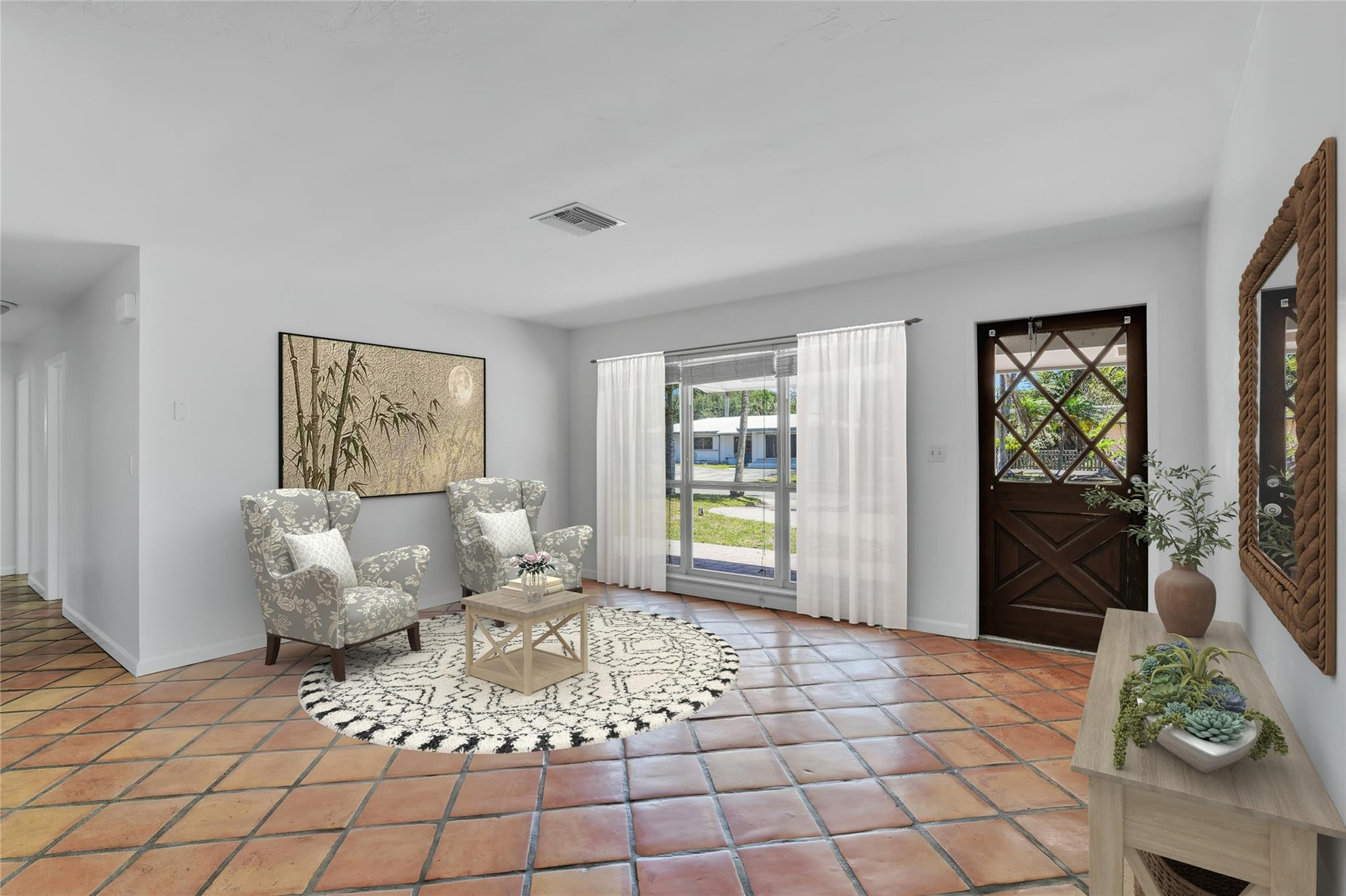 341 Southeast 8th Street Pompano Beach, FL 33060 - Photo 13 of 56 a living room with furniture and a floor to ceiling window