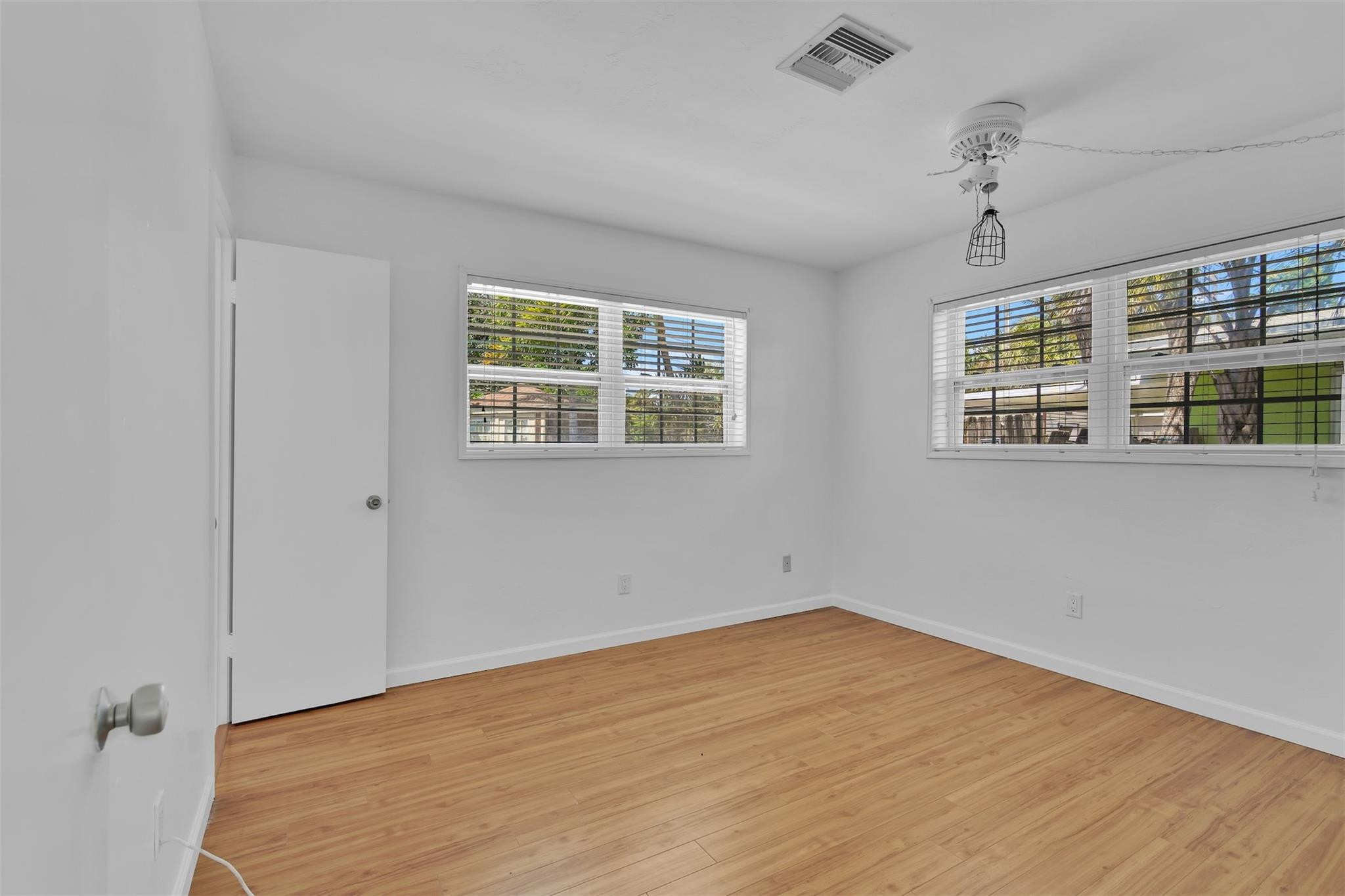341 Southeast 8th Street Pompano Beach, FL 33060 - Photo 17 of 56 a view of an empty room with a window