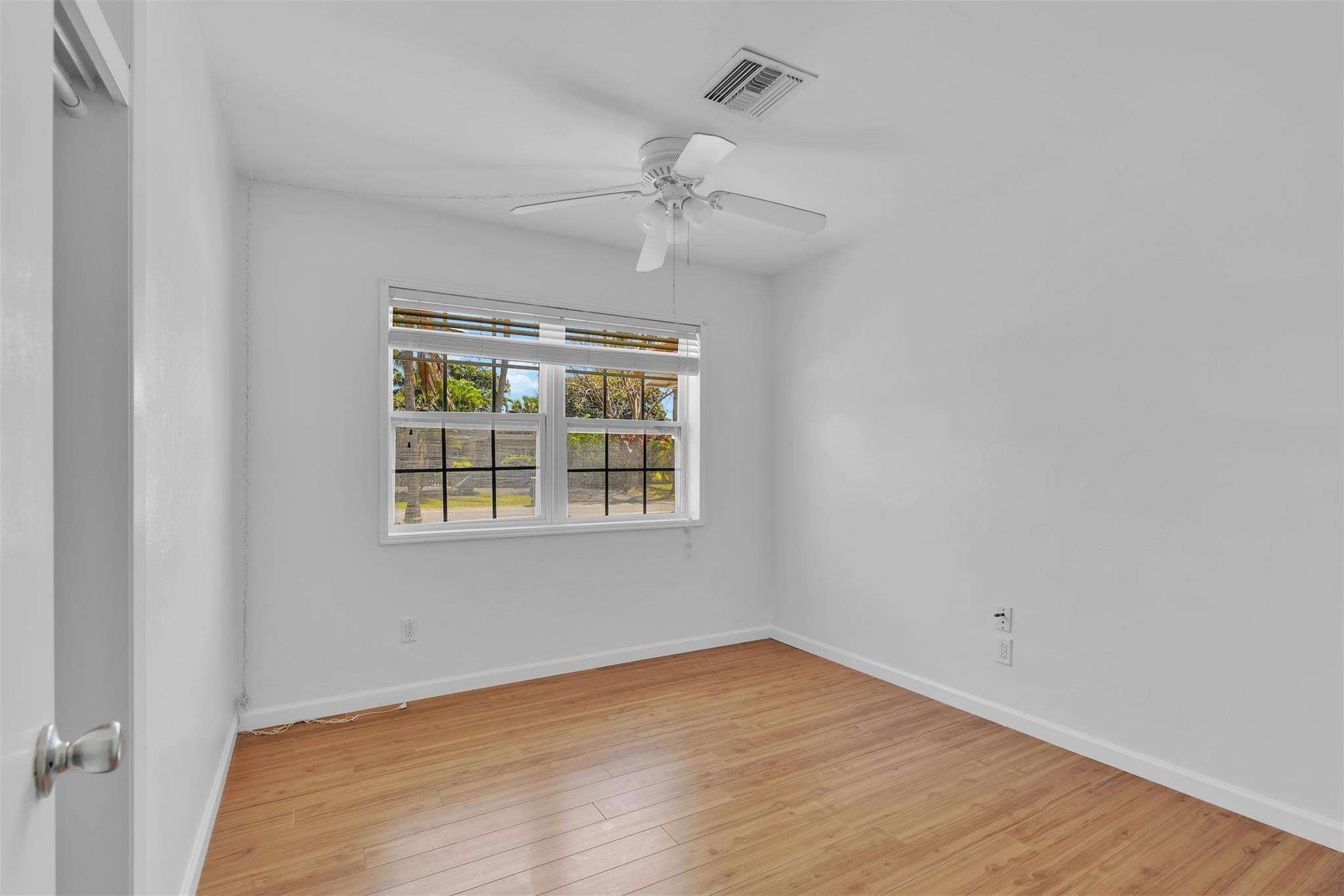 341 Southeast 8th Street Pompano Beach, FL 33060 - Photo 27 of 56 a view of an empty room with a window