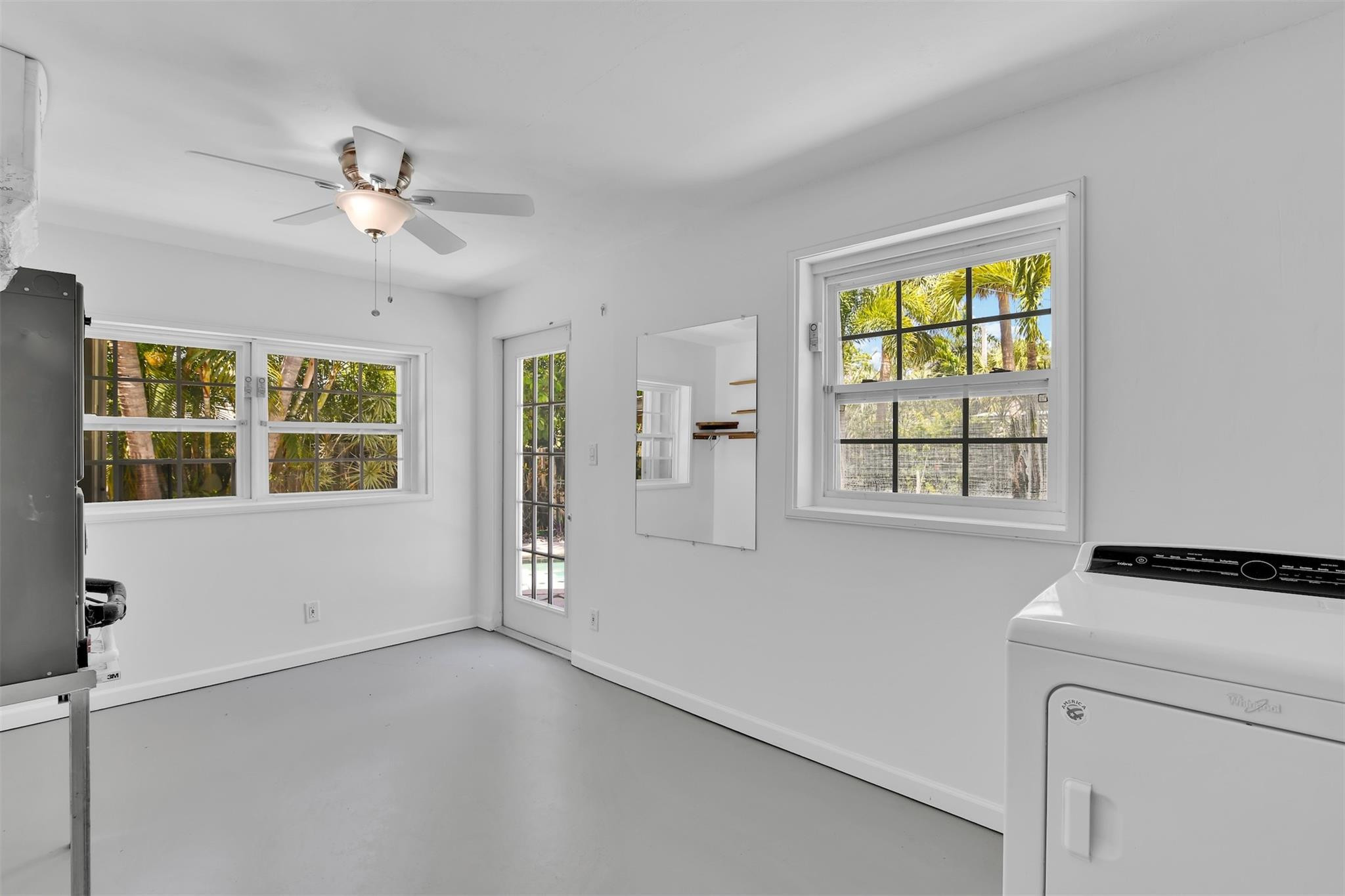 341 Southeast 8th Street Pompano Beach, FL 33060 - Photo 45 of 56 a view of an empty room with a window