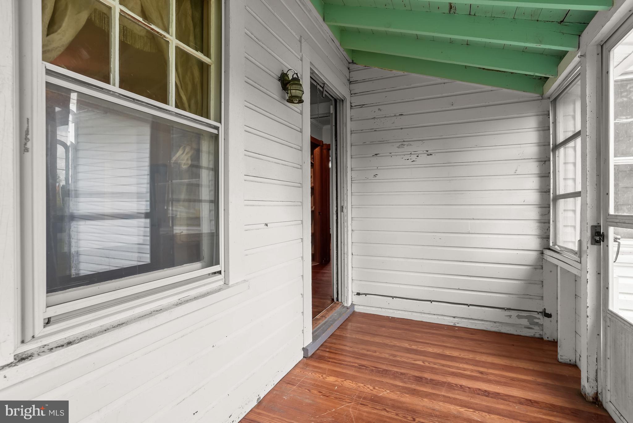4819 Atwell Road Shady Side, MD 20764 - Photo 14 of 29 Enclosed Porch