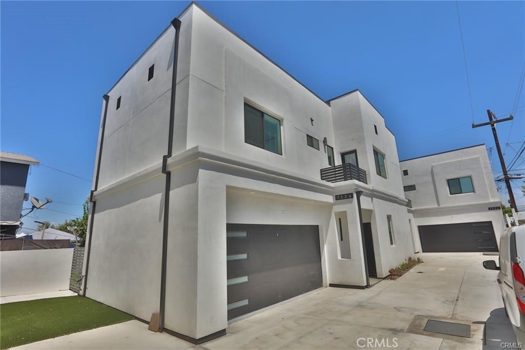 a view of a house with a garage